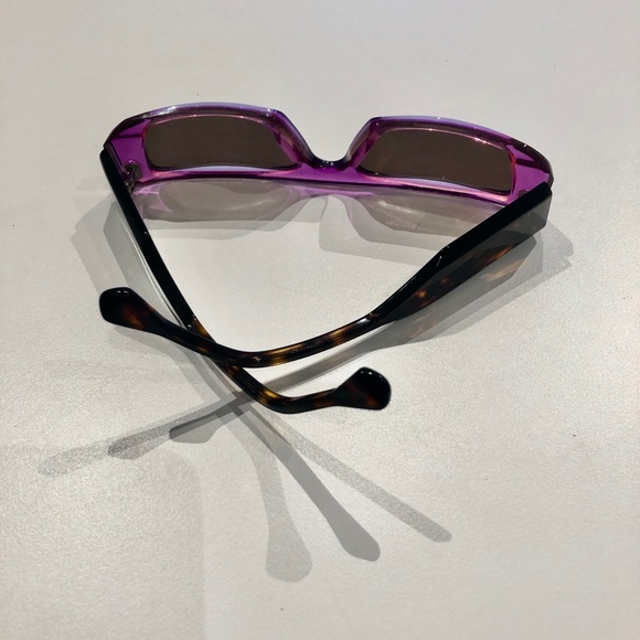 Christoph Broich by Theo magenta and tortoise sunglasses;...